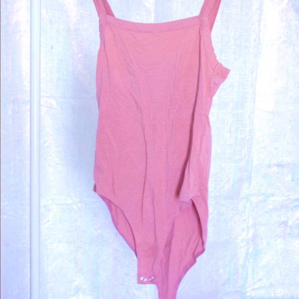 Pink body suit